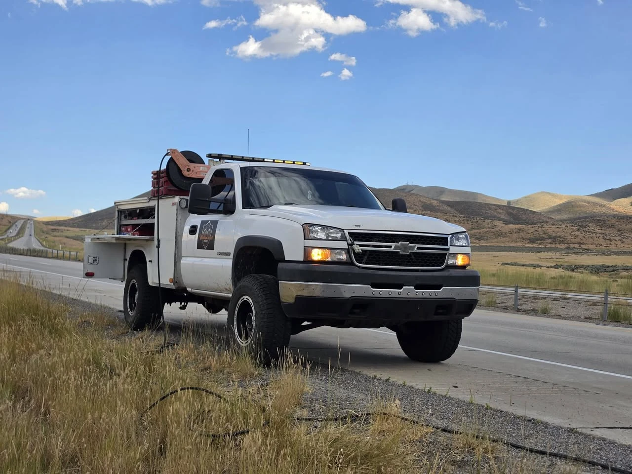 Western Diesel Workz mobile service truck parked along an Idaho highway